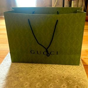 Reusable large Gucci bag dark olive green 23x17x8 inches.